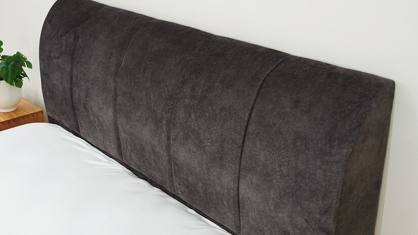 Vertical channel tufting. Thick padded headboard. 175mm thick. Extremely comfortable and cozy.