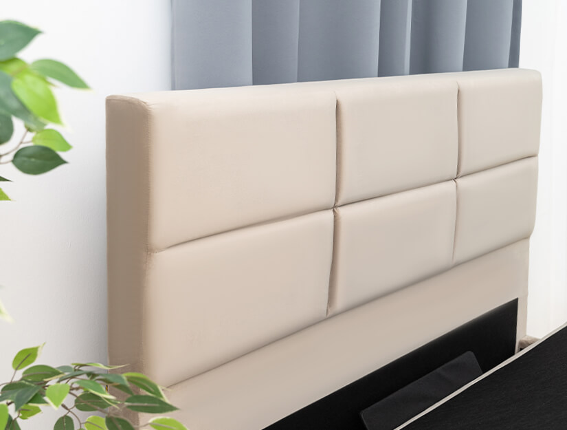 Tall and comfortable cushioned headboard.