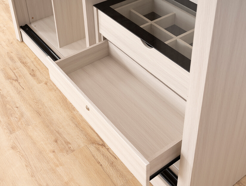 Spacious drawers are equipped with locks. 