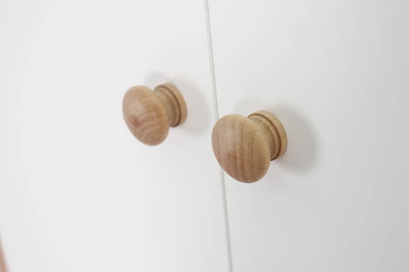 Beautifully crafted handles with a natural wood color.