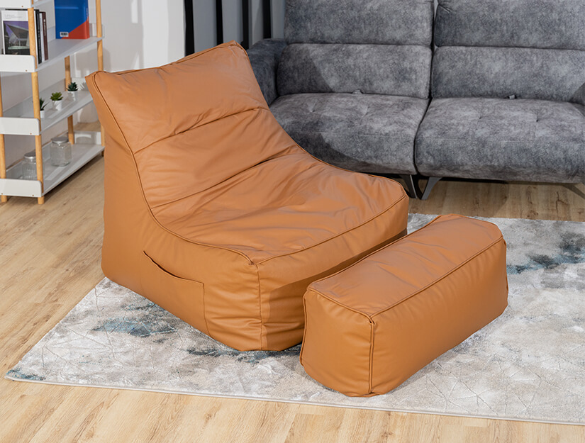 Comfy bean bag chair with ottoman. Versatile design.
