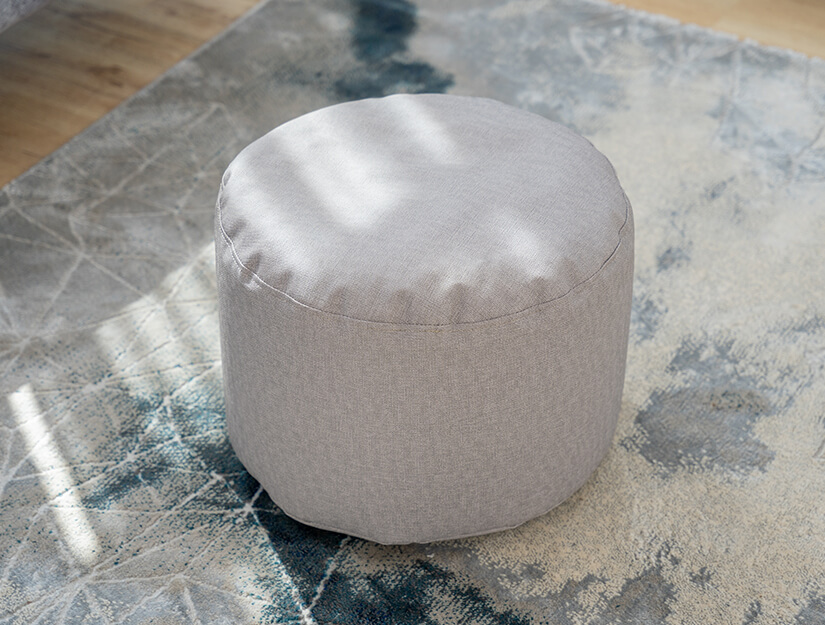 Comfy bean bag stool. Versatile design. Compact size.