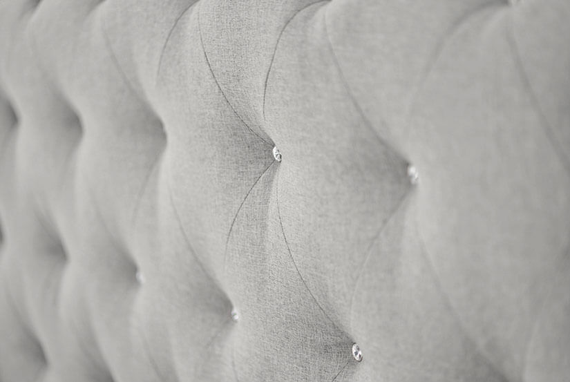 Carefully tufted with faux crystals for a touch of sparkle.