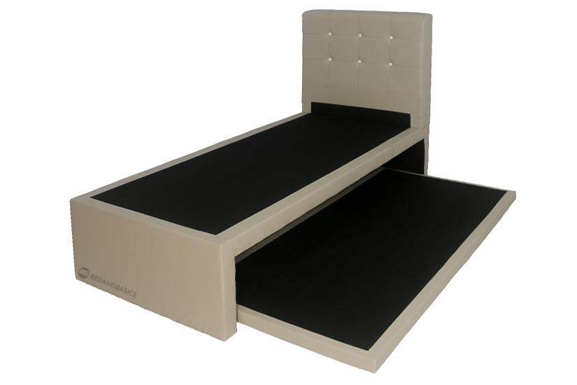 The frame includes a pull-out bed with a sturdy mattress support base.