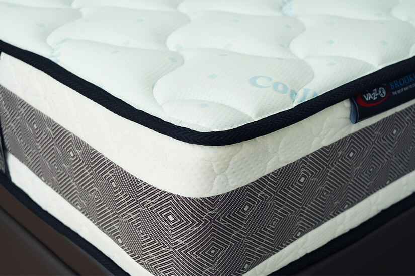 Double Coil Sleep System with Bonnell springs. Promotes durability and spinal support.